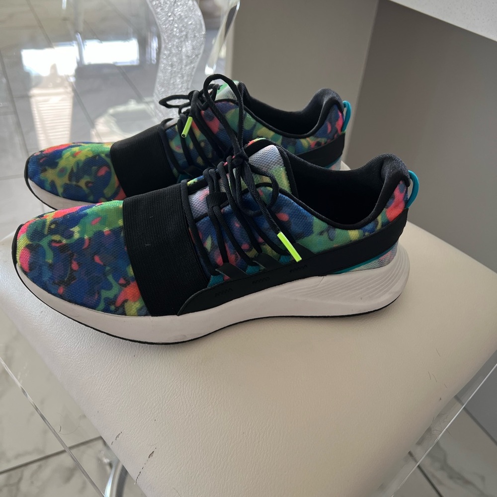 Like new multi colored athletic shoes. Very lightweight and supportive.